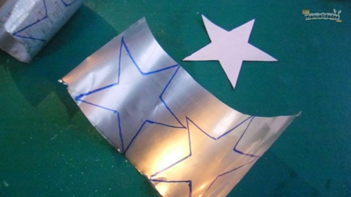 Convierte las latas de gaseosa en estrellas de navidad Convierte las latas de gaseosa en estrellas de navidad